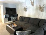 Mammoth Lakes Condo Rental Sunshine Village 114: Living Room Couch with a Large SmartTV
